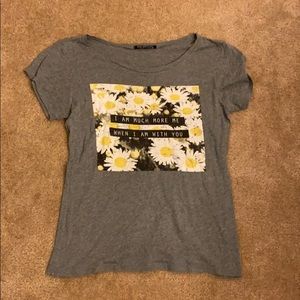 gray t-shirt with sunflowers